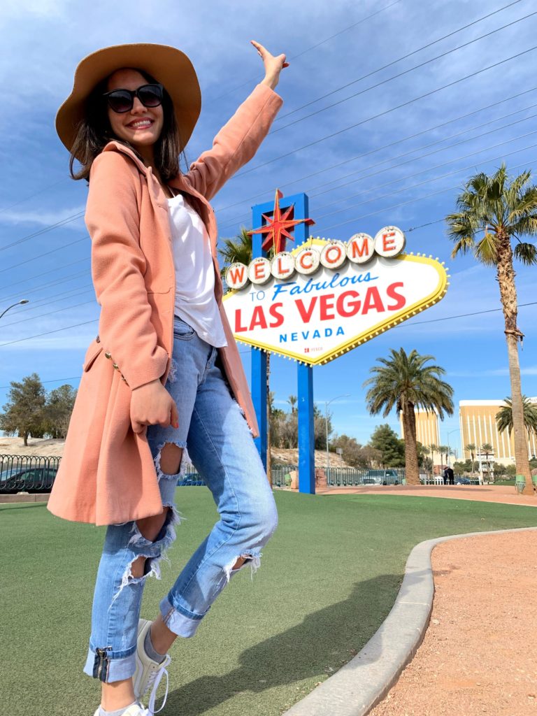 girl with las vegas sign