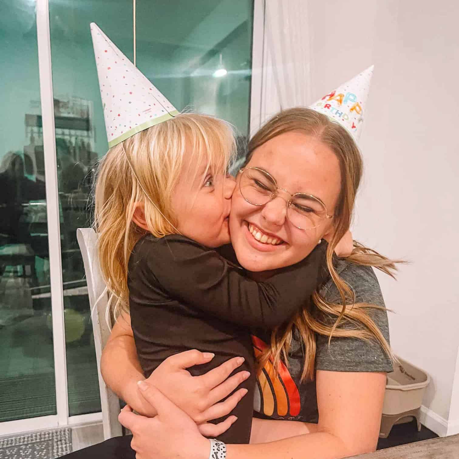 Au pair and host child celebrating a birthday.